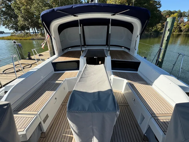 Slide: The Image of Beneteau Oceanis 46.1 yacht deck, 2022 model, docked by a serene lake. - 17