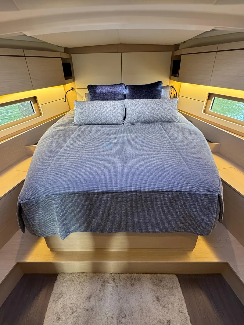 Slide: The Image of Luxurious cabin interior of 2022 Beneteau Oceanis 46.1 yacht with cozy bedding. - 30