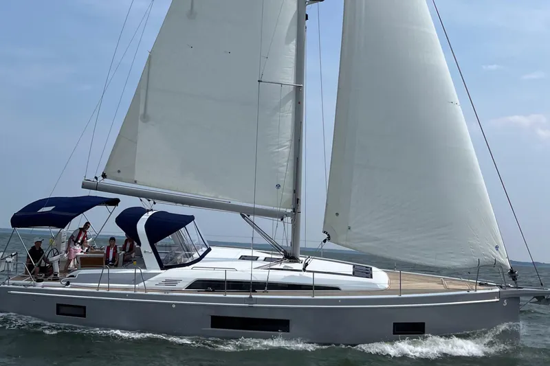 Slide: The Image of 2022 Beneteau Oceanis 46.1 sailing yacht on open water. - 40