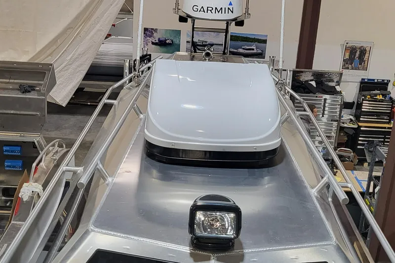 Slide: The Image of 2023 Life Proof 31 Walk Around Cabin boat with Garmin equipment in a workshop. - 7