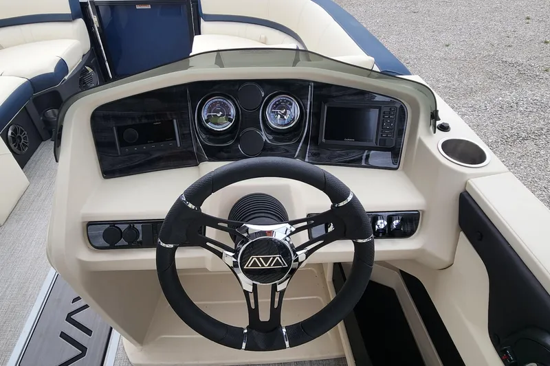 Slide: The Image of Steering console of 2025 Avalon Platinum LSZ 2185 Quad Lounger Shift, featuring modern controls and gauges. - 6