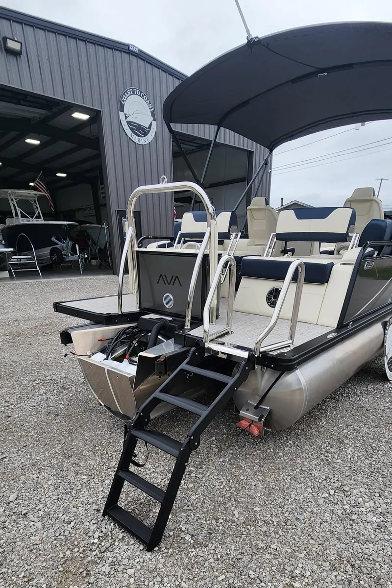 Slide: The Image of 2025 Avalon Platinum LSZ 2185 Quad Lounger Shift pontoon boat with ladder and canopy. - 8