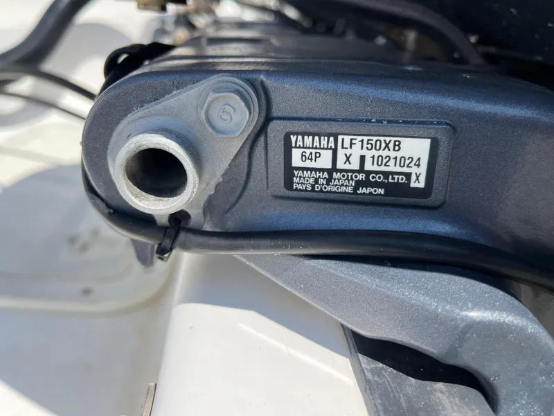 Slide: The Image of Yamaha LF150XB engine on 2004 Boston Whaler 240 Outrage boat. - 1