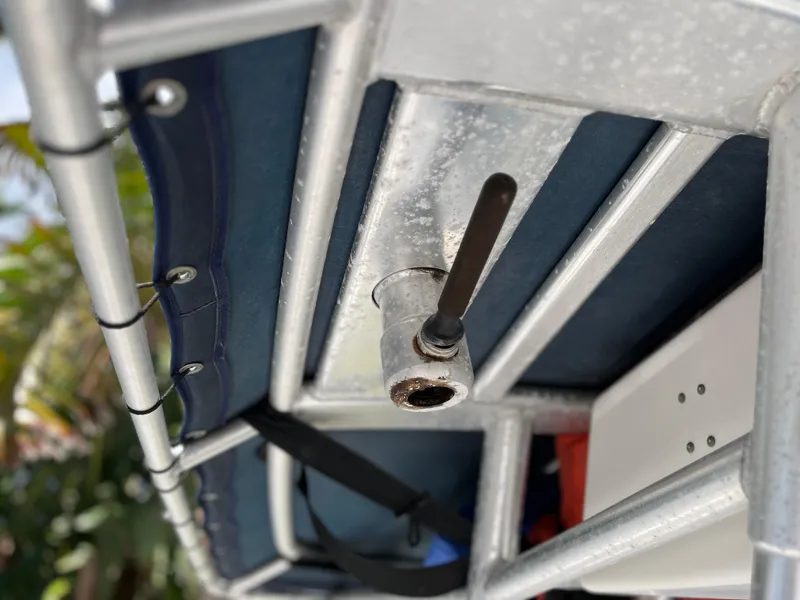 Slide: The Image of Close-up of 2004 Boston Whaler 240 Outrage boat canopy and fittings. - 21