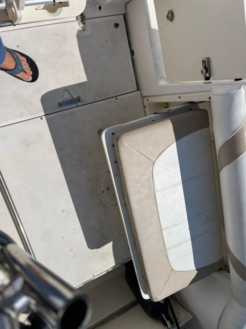 Slide: The Image of Interior view of a 2004 Boston Whaler 240 Outrage boat deck. - 3