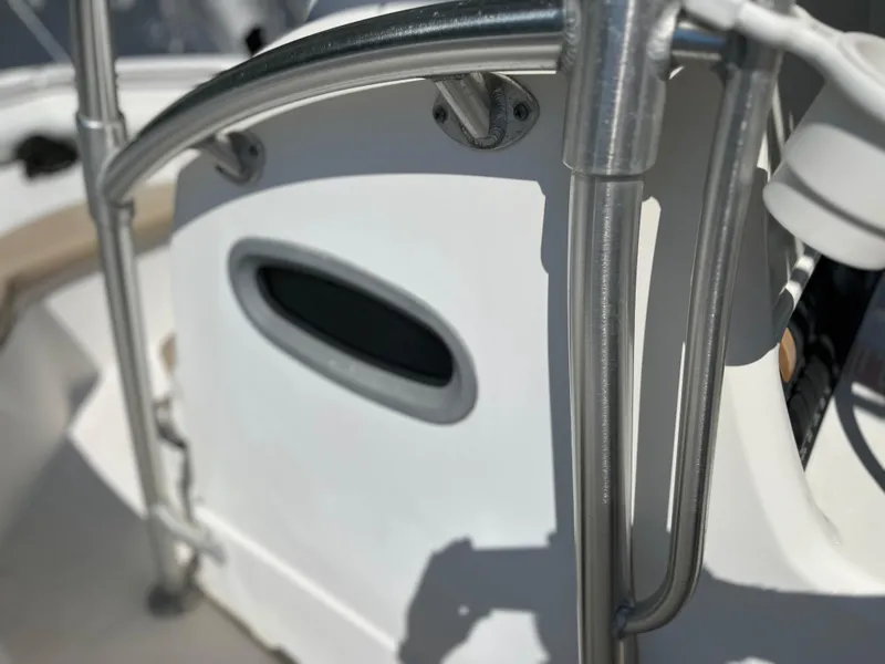 Slide: The Image of Close-up of 2004 Boston Whaler 240 Outrage boat railing and console. - 34