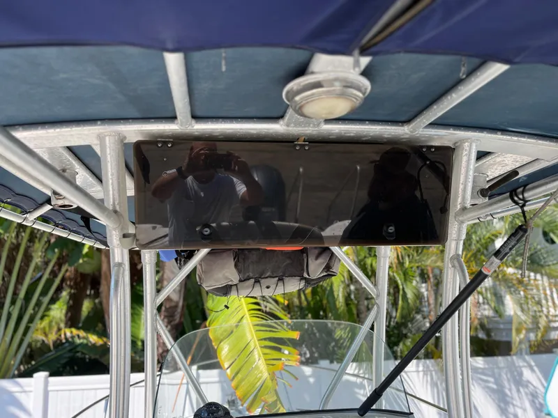 Slide: The Image of Boston Whaler 240 Outrage 2004 boat interior with canopy and equipment. - 9