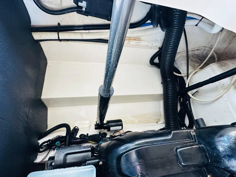 Slide: The Image of Engine compartment of 2015 Sea Ray 250 SLX boat with visible components and wiring. - 19