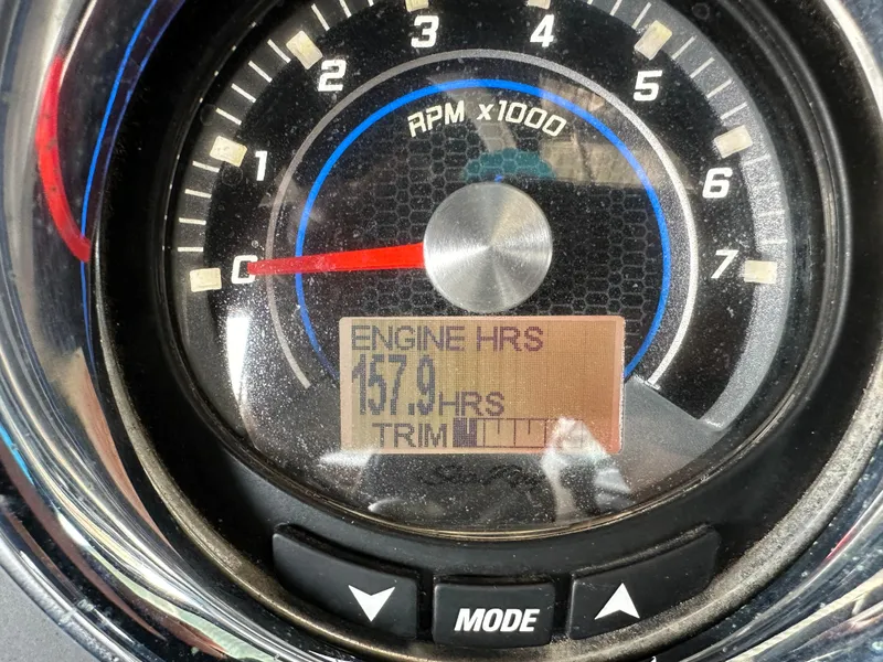 Slide: The Image of Close-up of 2015 Sea Ray 250 SLX tachometer showing 157 engine hours. - 37