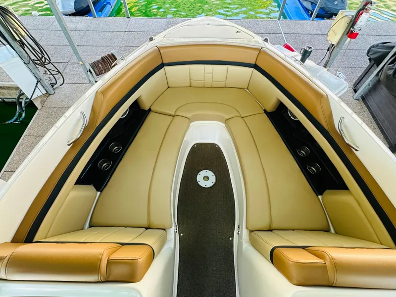 Slide: The Image of Luxurious 2015 Sea Ray 250 SLX boat interior with tan leather seating. - 44