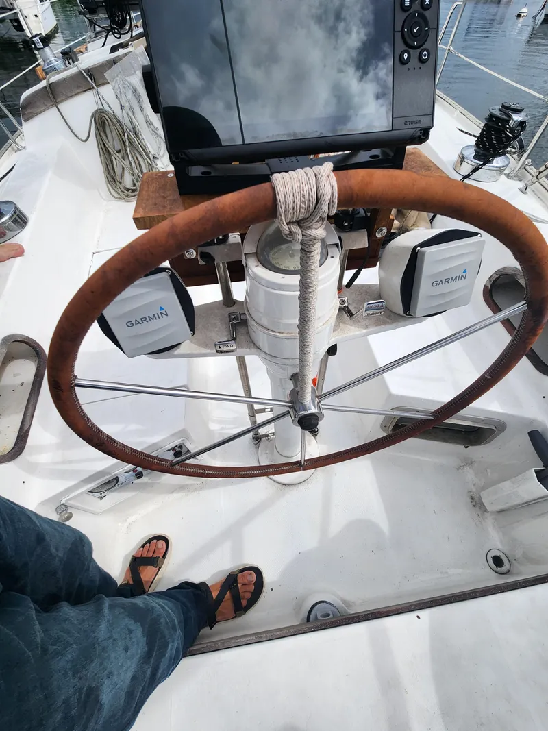 Slide: The Image of Steering wheel of a 1987 Catalina 36 sailboat with Garmin navigation equipment. - 16