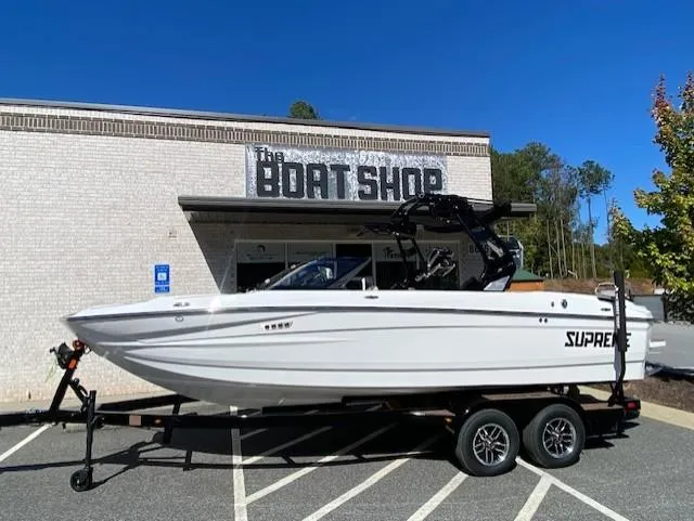 The Image of 2025 Supreme S220 boat on trailer outside The Boat Shop. - 0
