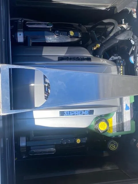 Slide: The Image of Supreme S220 engine compartment, 2025 model, showcasing modern design and components. - 10