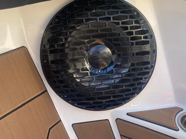 Slide: The Image of Close-up of a 2025 Supreme S220 speaker with stylish grille design. - 12