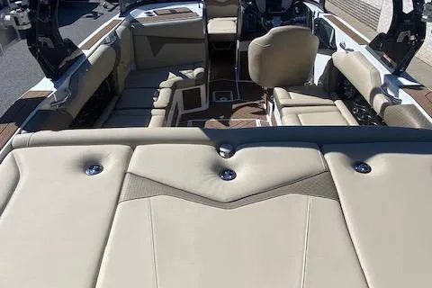 Slide: The Image of Luxurious interior of 2025 Supreme S220 boat with beige leather seating. - 14