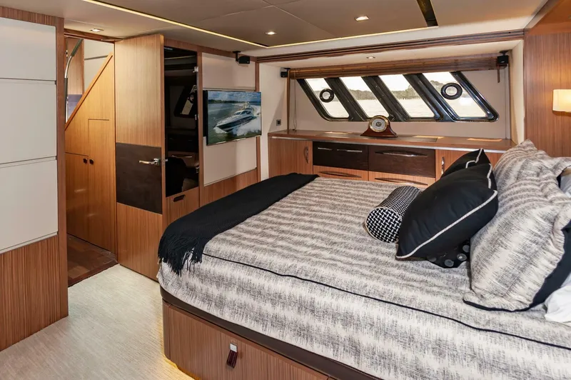 Slide: The Image of Luxurious 2015 Sea Ray L659 Fly yacht bedroom interior with modern design and elegant furnishings. - 47