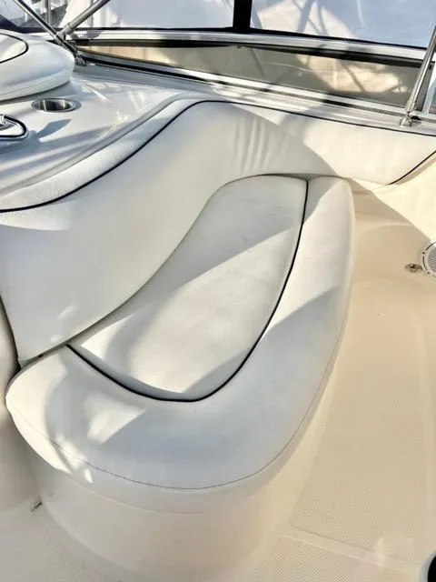 Slide: The Image of 2009 Meridian 391 Sedan interior seating with white upholstery and sleek design. - 15