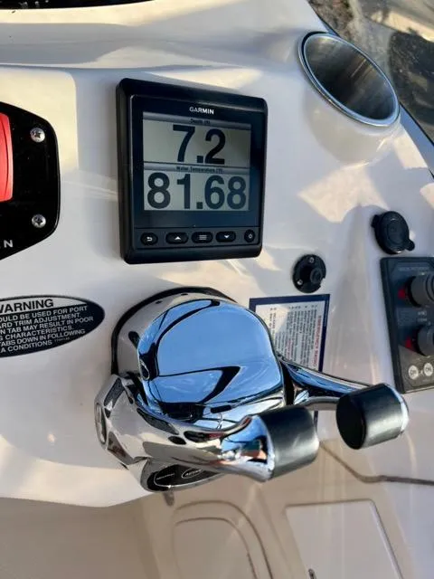 Slide: The Image of Close-up of 2009 Meridian 391 Sedan boat controls with Garmin display. - 23