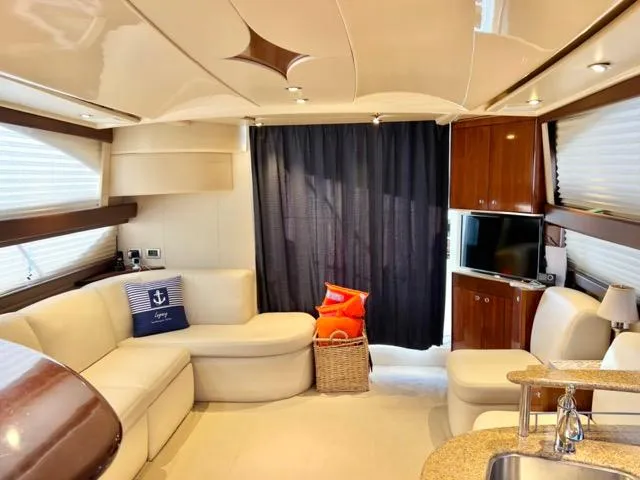 Slide: The Image of Luxurious interior of 2009 Meridian 391 Sedan yacht with plush seating and modern amenities. - 32
