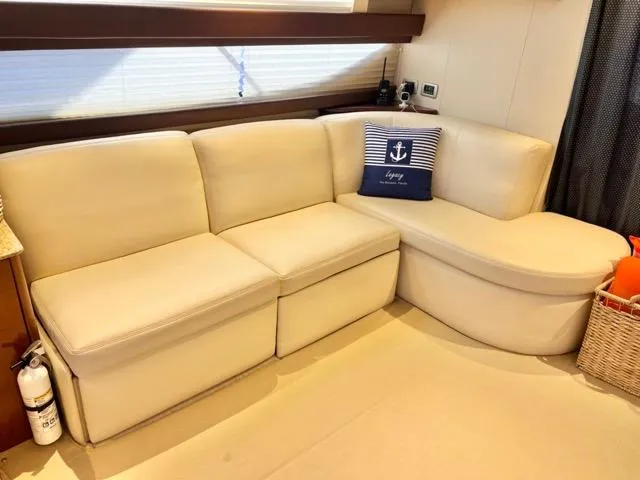 Slide: The Image of Luxurious interior of 2009 Meridian 391 Sedan with cream sofa and nautical decor. - 33