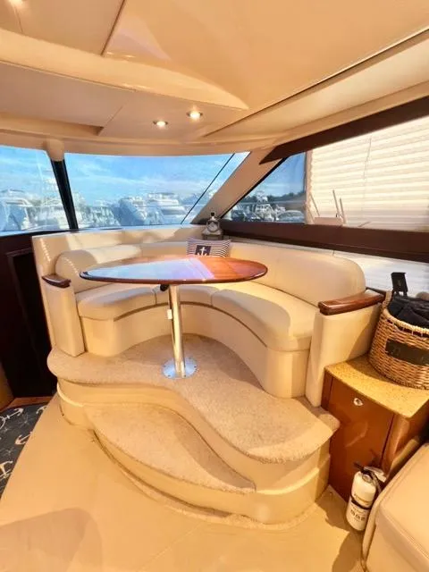 Slide: The Image of Interior of 2009 Meridian 391 Sedan yacht with elegant seating and table. - 36
