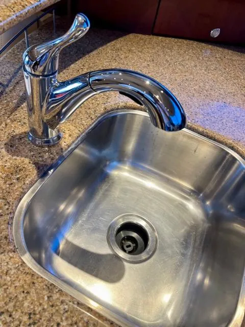 Slide: The Image of Stainless steel sink and faucet in 2009 Meridian 391 Sedan yacht kitchen. - 40