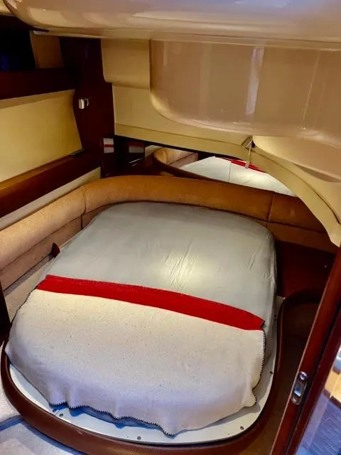 Slide: The Image of Cozy cabin interior of 2009 Meridian 391 Sedan yacht with comfortable bed. - 41
