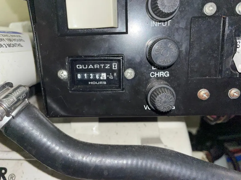 Slide: The Image of Close-up of a 2006 Formula 330 Sun Sport engine hour meter showing 1365 hours. - 33