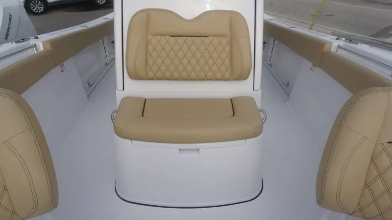 Slide: The Image of 2025 Sportsman 282 Open boat interior with tan cushioned seating. - 12