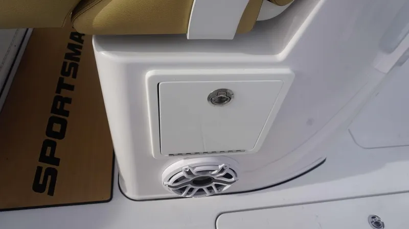 Slide: The Image of 2025 Sportsman 282 Open boat interior with storage compartment and speaker. - 23