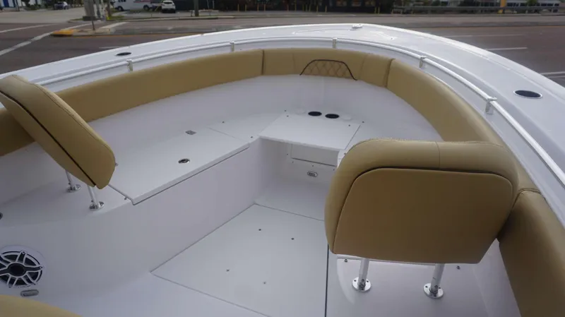 Slide: The Image of 2025 Sportsman 282 Open boat interior with tan seating and white deck. - 8