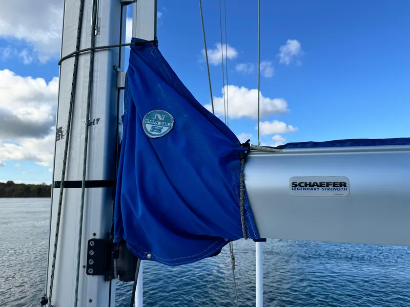 Slide: The Image of Jeanneau Sun Odyssey 40 sailboat mast detail with blue cover, Schaefer equipment, 2001 model. - 12