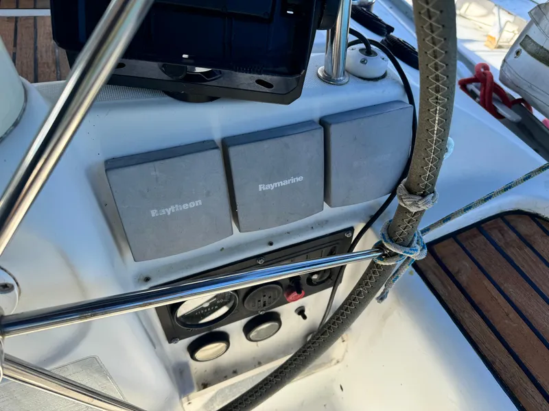 Slide: The Image of Control panel of a 2001 Jeanneau Sun Odyssey 40 sailboat with Raymarine equipment. - 17