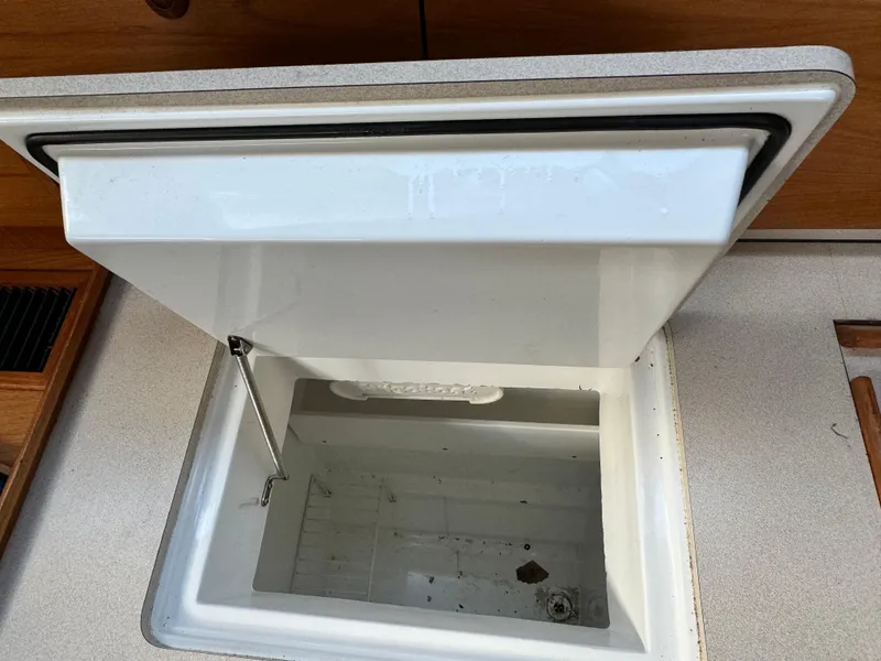 Slide: The Image of Open storage compartment on 2001 Jeanneau Sun Odyssey 40 sailboat. - 27