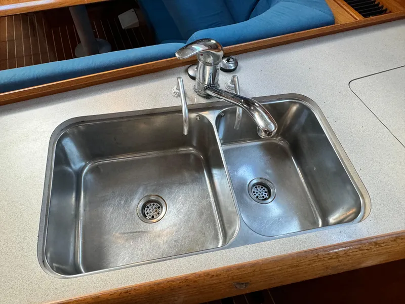 Slide: The Image of Stainless steel double sink in 2001 Jeanneau Sun Odyssey 40 yacht kitchen. - 29