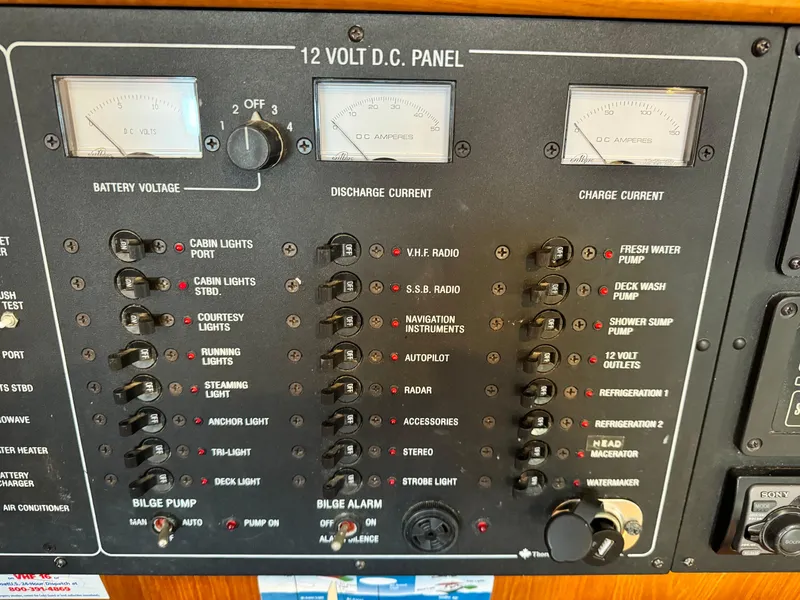 Slide: The Image of 12V DC panel on 2001 Jeanneau Sun Odyssey 40 yacht, showing battery voltage and current gauges. - 35