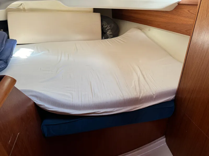 Slide: The Image of Cozy cabin bed in 2001 Jeanneau Sun Odyssey 40 sailboat interior. - 45