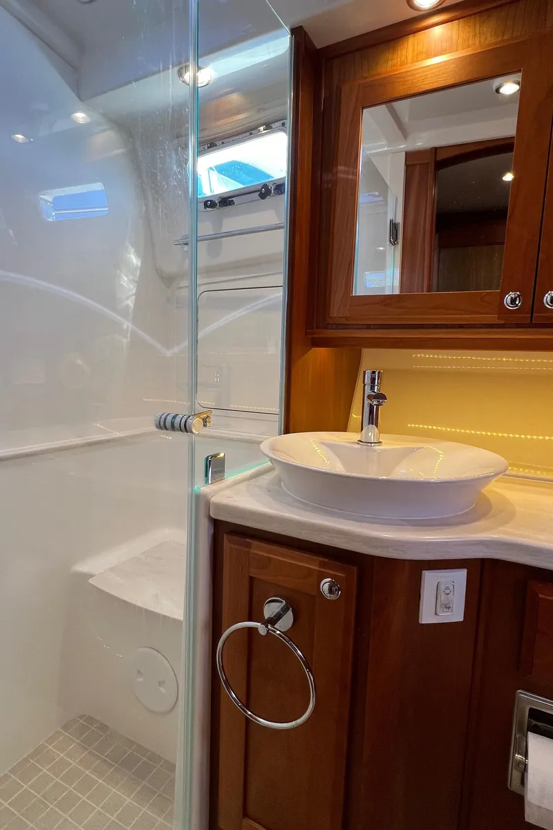 Slide: The Image of Luxurious bathroom in 2018 Sabre 45 Salon Express yacht with modern fixtures. - 18