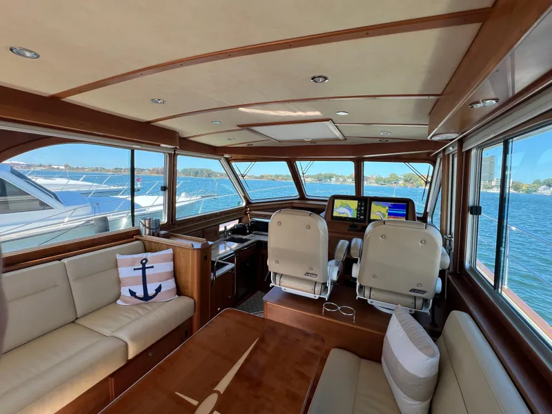 Slide: The Image of Interior of 2018 Sabre 45 Salon Express yacht with luxurious seating and navigation equipment. - 31