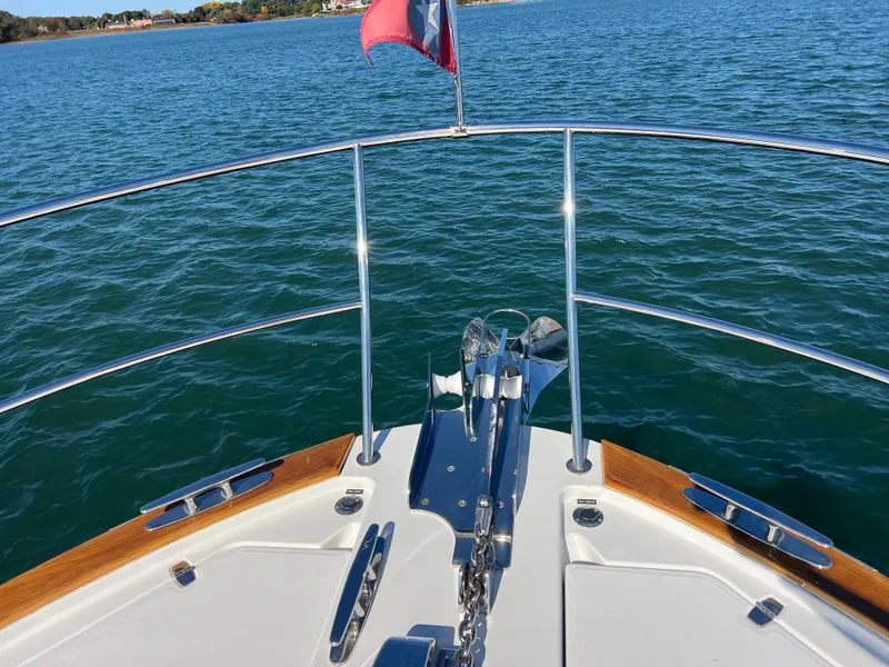 Slide: The Image of Bow view of 2018 Sabre 45 Salon Express yacht on open water. - 38