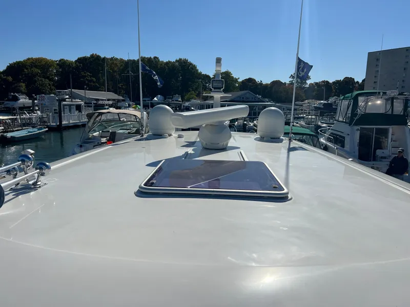 Slide: The Image of 2018 Sabre 45 Salon Express yacht docked in a marina. - 40