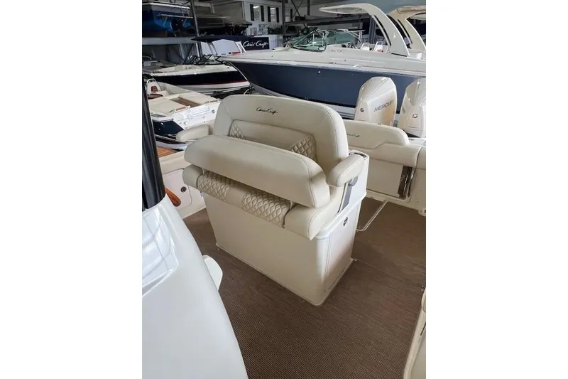 Slide: The Image of 2024 Chris-Craft Catalina 28 boat interior with luxurious seating and elegant design. - 8