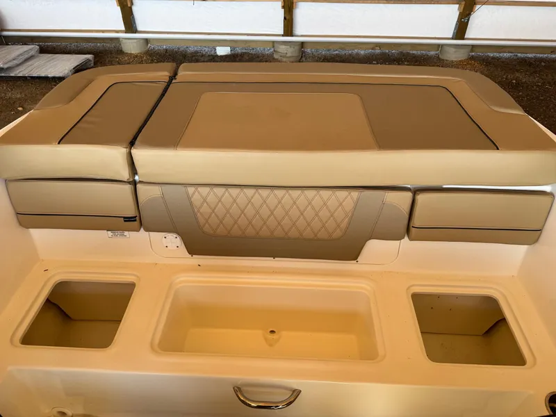 Slide: The Image of 2025 Bayliner VR4 Bowrider I/O boat seating and storage compartments. - 13