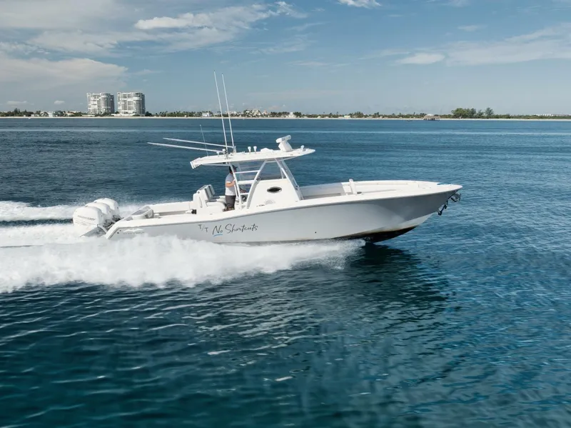 The Image of 2020 Invincible Open Fisherman boat cruising on clear blue water. - 1