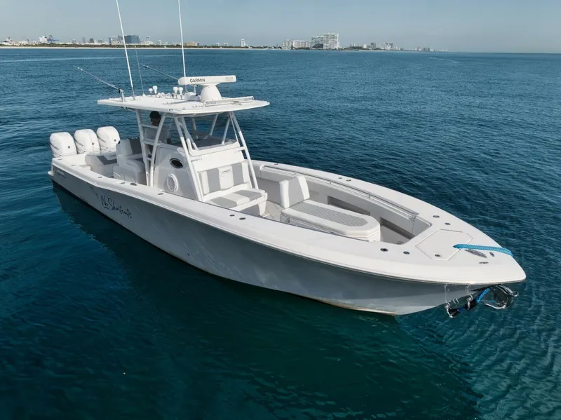 Slide: The Image of 2020 Invincible Open Fisherman boat on calm blue ocean waters. - 16