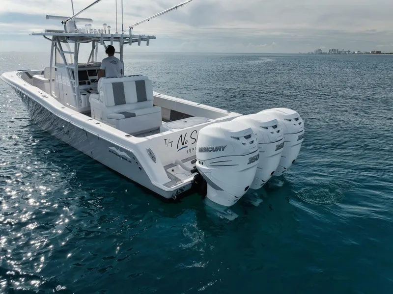 Slide: The Image of 2020 Invincible Open Fisherman boat with triple Mercury engines on calm ocean. - 19