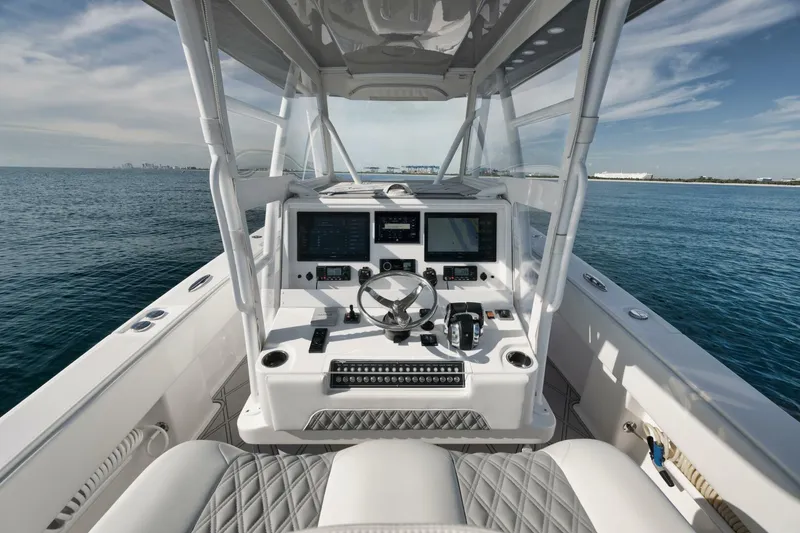 Slide: The Image of 2020 Invincible Open Fisherman boat dashboard with ocean view. - 32