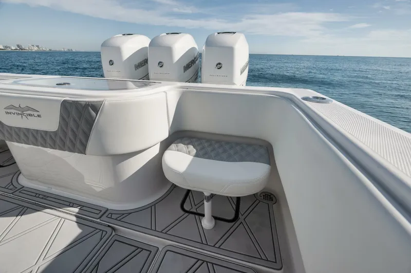 Slide: The Image of 2020 Invincible Open Fisherman boat with triple engines on calm ocean waters. - 39