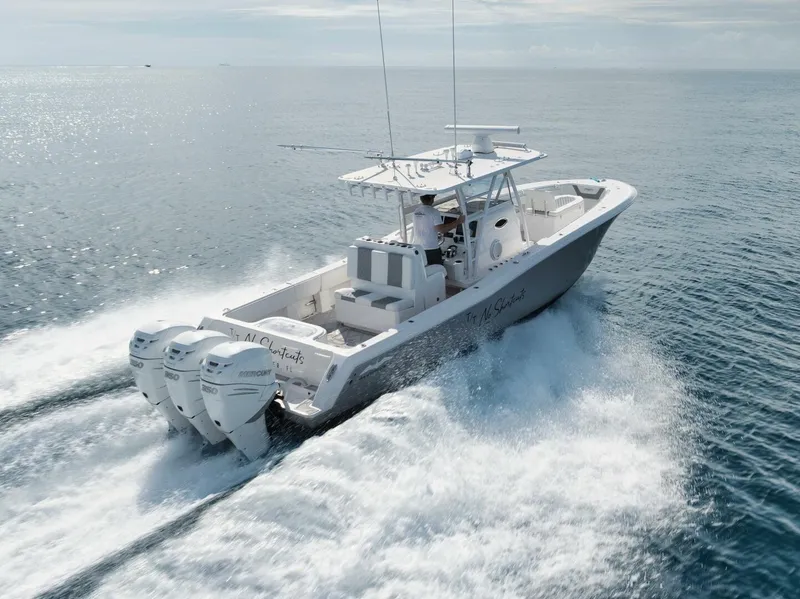 Slide: The Image of 2020 Invincible Open Fisherman boat cruising on open water. - 7