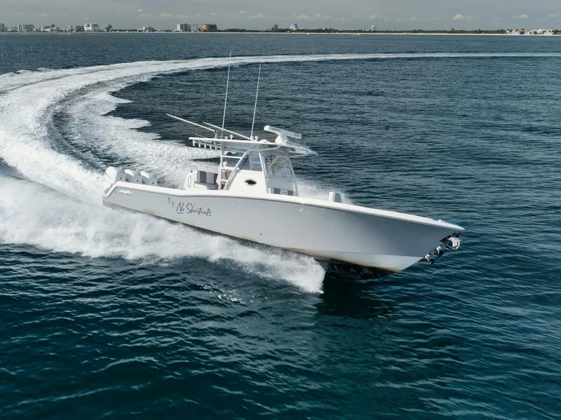 Slide: The Image of 2020 Invincible Open Fisherman boat cruising on open water. - 9